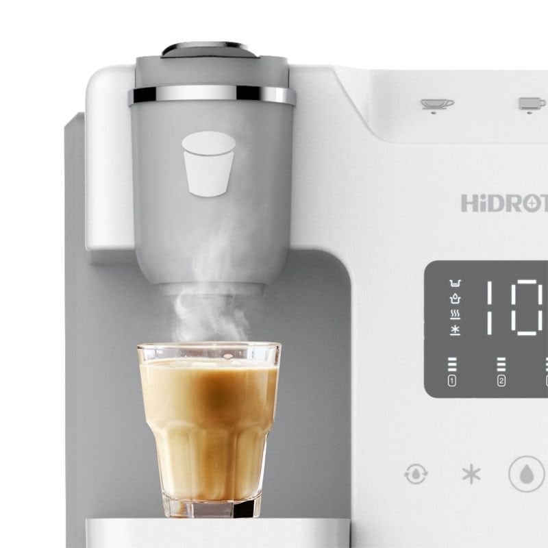 Freshly brewed coffee dispensed from a modern coffee machine, showcasing high-quality filtration and brewing technology.